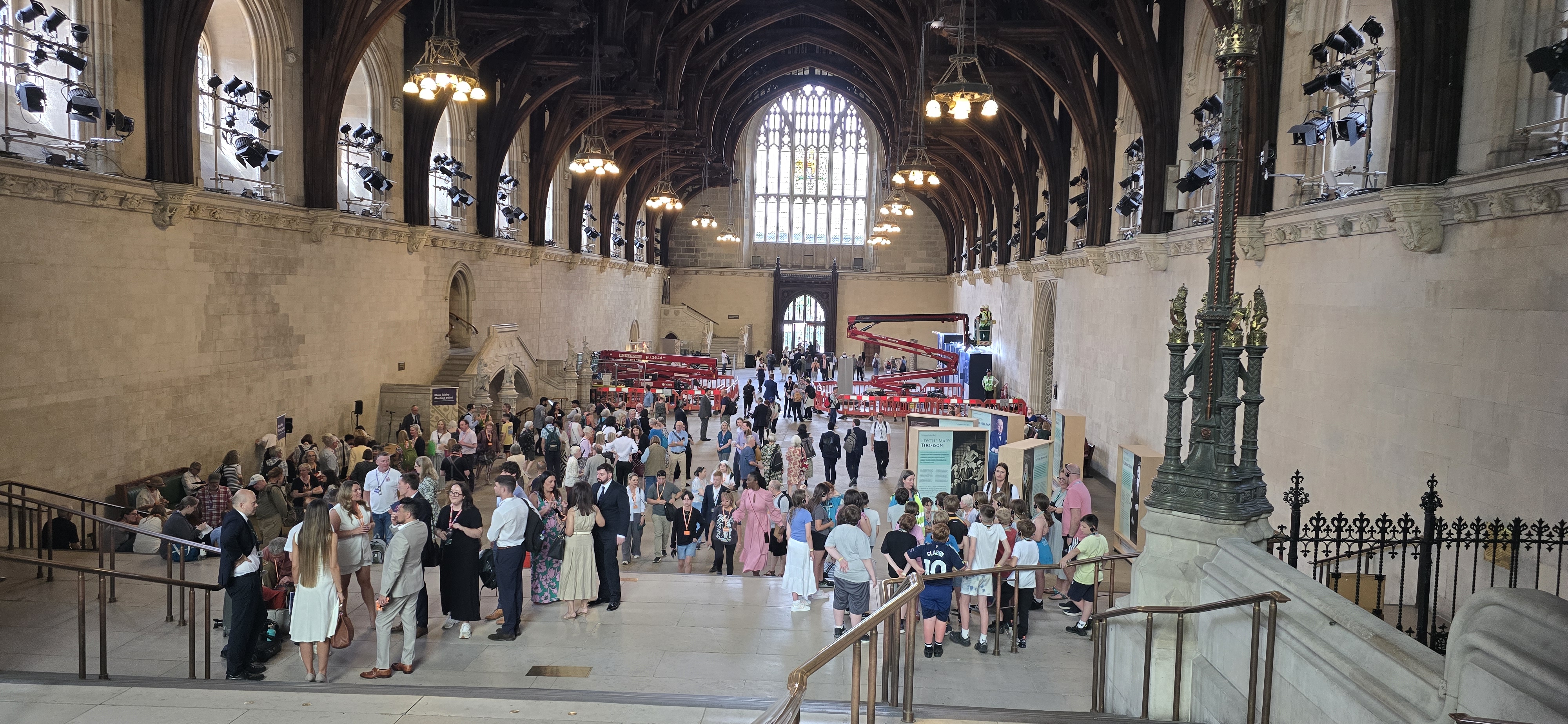 Crowds of activists in parliament talking to each other as part of the Mass Lobby campaign